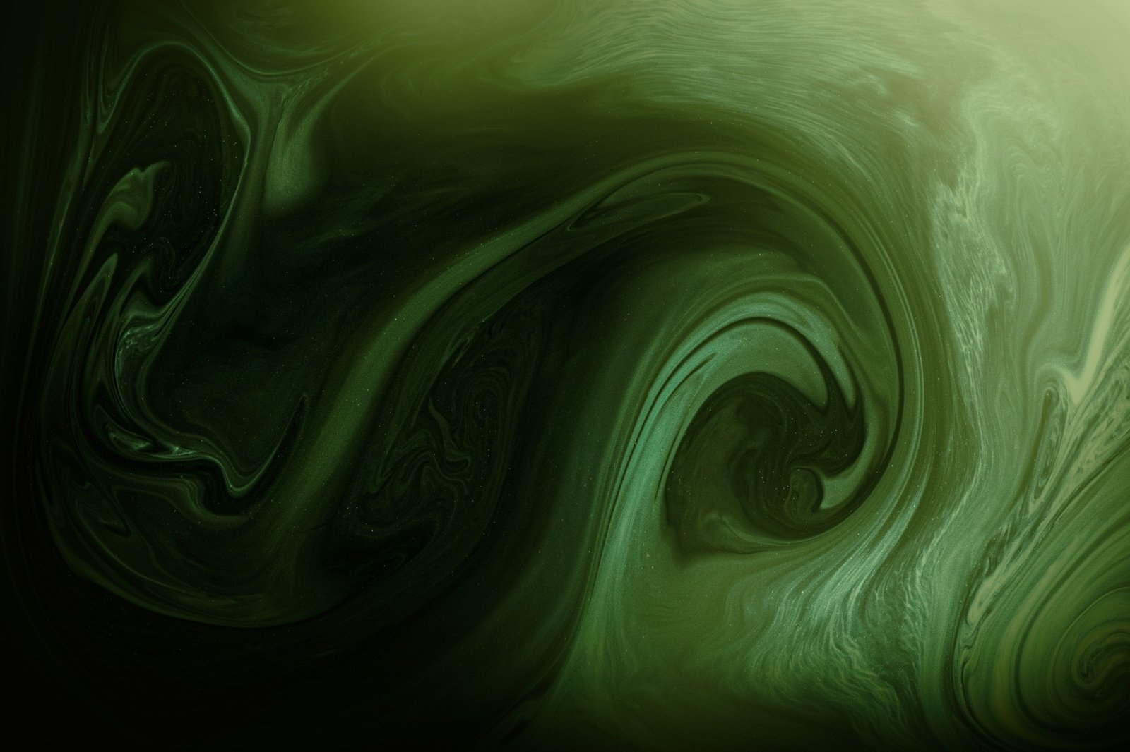 Abstract swirls of dark and light green